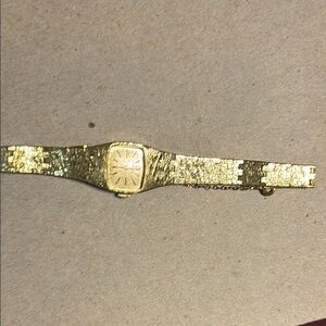 Woman’s Gold Plated Omega Bracelet Watch